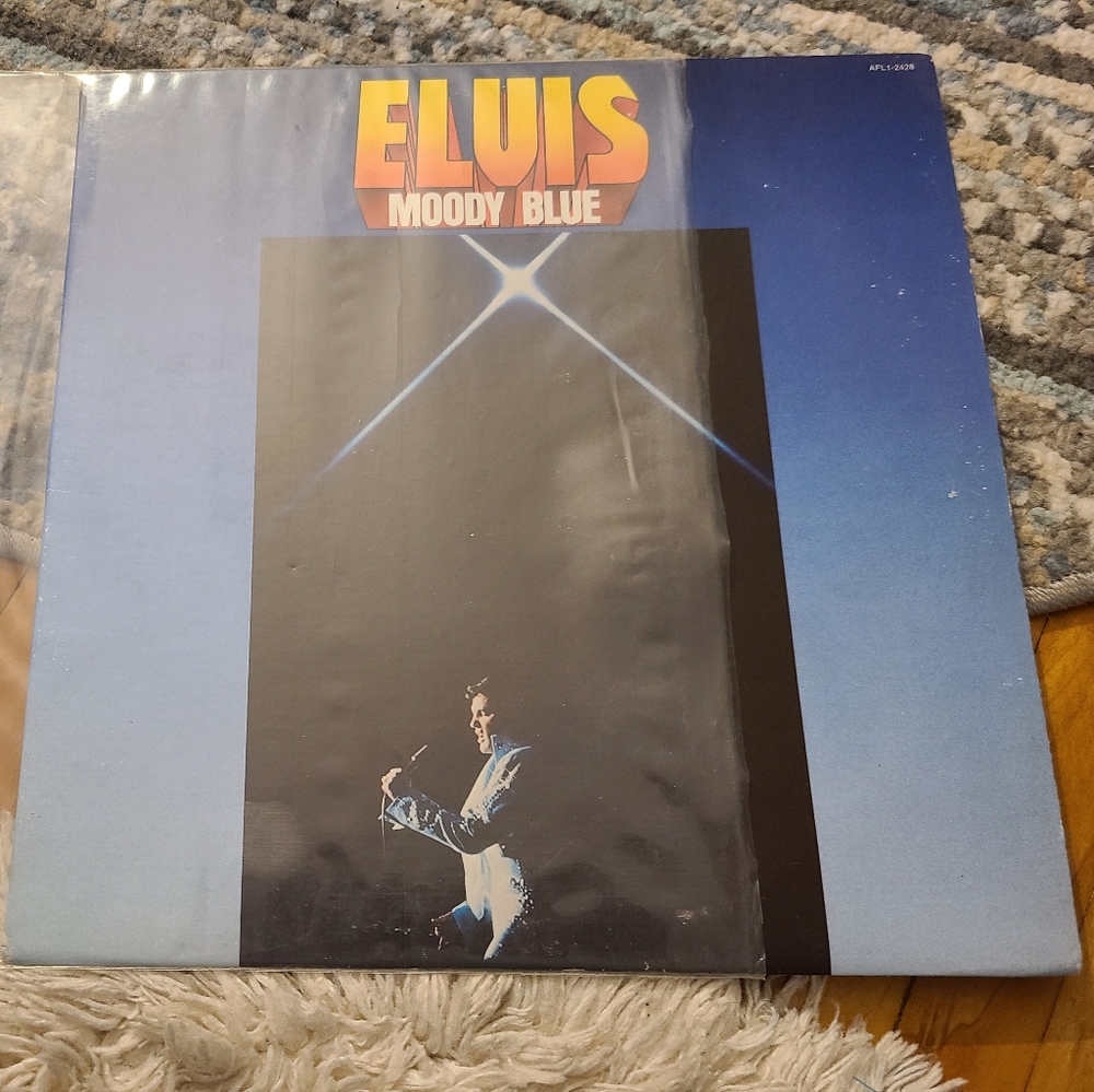 Elvis Presley Moody Blue vintage vinyl record Blue record. Pristine